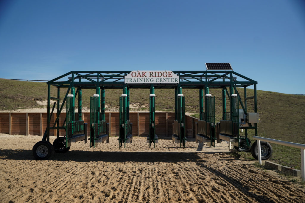 Regulation-sized 6-stall starting gate on the track at oak ridge training center